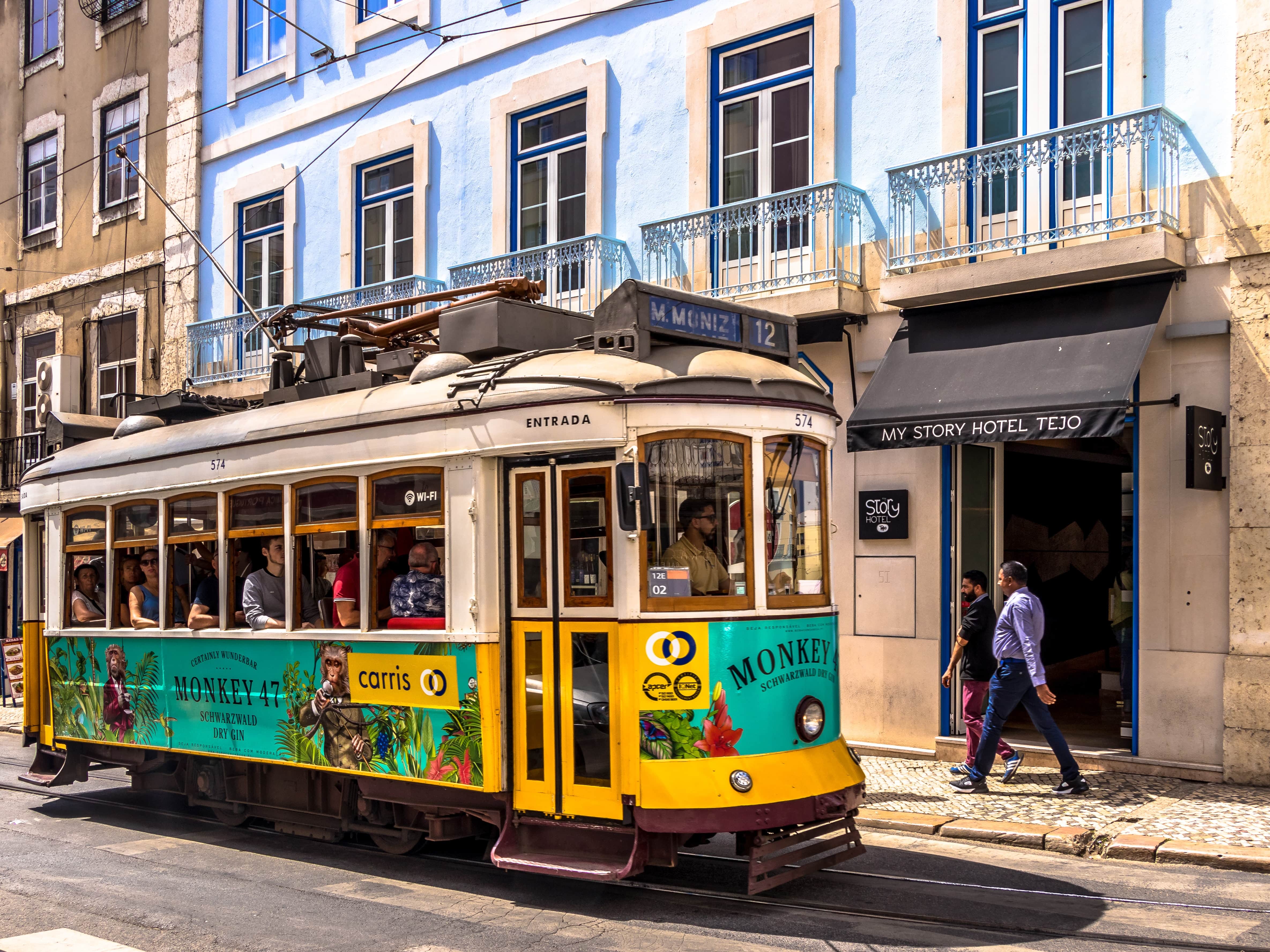 Typical yellow tram in Porto, Portugal PEO 